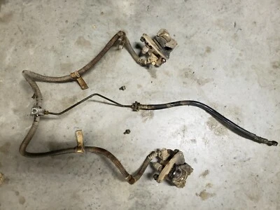 2006 Yamaha Wolverine 350 Front Brake Caliper + lines Assembly Calipers  - Image 1 of 4