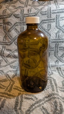 One Dozen New  16 Oz Amber Glass Bottles, with Lids - Image 1 of 2