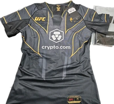 NUEVO CON ETIQUETAS UFC Auténtico Venum Fight Night Jersey Mujer Pequeño Negro y Dorado Dry Tech Foto 1 de 4