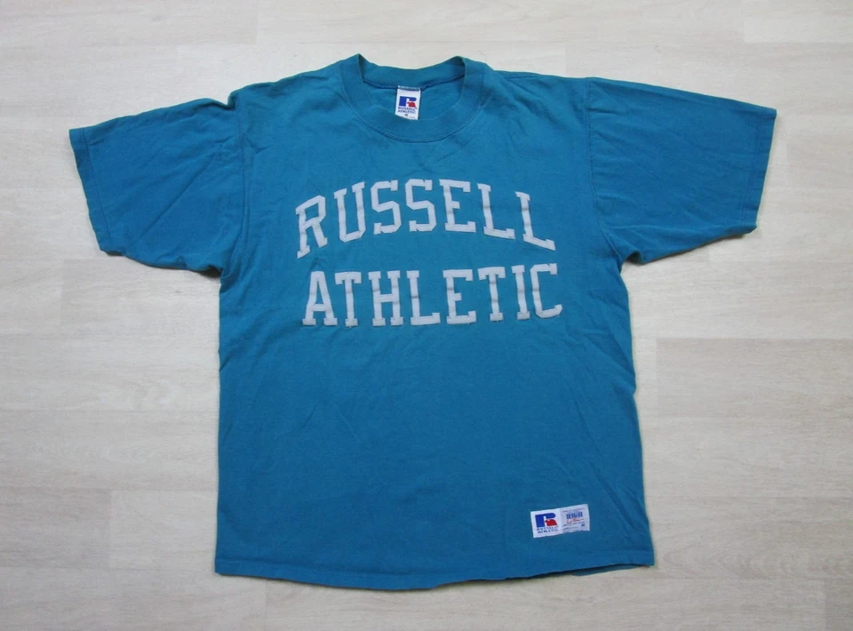 Vintage RUSSELL ATHLETIC Aqua Blue Spell Out Logo T-Shirt (M) Combed Cotton 90s - Image 1 of 4