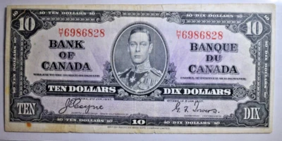 1937 CANADÁ US$ 10 ~ TORRES COYNE HT ~ ERRO DE CORTE SELVAGEM NAS MARGENS SUPERIOR E INFERIOR! - Imagem 1 de 2