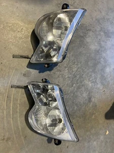 Arctic Cat SnoPro 600 headlights  5855770 L 0609-853 and 5855760 R 0609-852 - Picture 1 of 7
