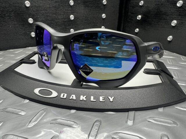 ÓCULOS DE SOL OAKLEY JULIET - LENTE AZUL DARK BLUE ARMAÇÃO CINZA