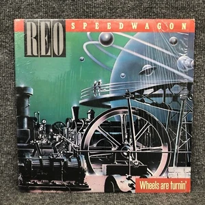 REO Speedwagon Wheels Are Turnin' Vinyl LP Record 1984 Epic Shrink Wrap NM / NM - Picture 1 of 5