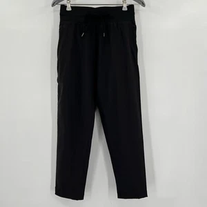 Free Fly Women's Breeze Cropped 7/8 Pants in Black sz XS Active Mid-Rise Tapered - Picture 1 of 10