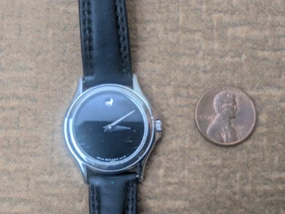 Reloj Movado Museum Clásico Cuarzo Esfera Negra Correa de Cuero para Damas Tono Plateado B Foto 1 de 4