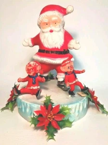 Vintage Florabelle Blow Mold Plastic Skiing Santa with Elves Christmas 8 inch - Picture 1 of 9
