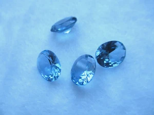 LEICHTER AQUAMARIN SPINEL OVALE LOSE EDELSTEINE 10 MM X 14 MM - VERSCHIEDENE PACKUNGEN #108 - Bild 1 von 4