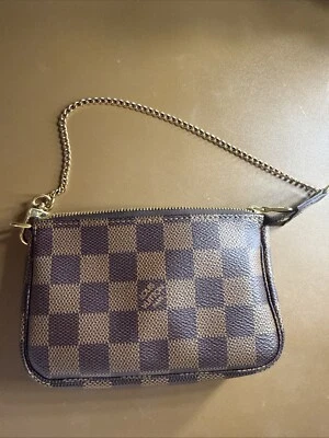 NEW! Authentic Louis Vuitton Mini Pochette Damier Ebene SF4220 - Image 1 of 4