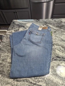Levis FLARE 542 Jeans Women's plus size 22 M Low Medium Wash Stretch Y2K Denim - Picture 1 of 10