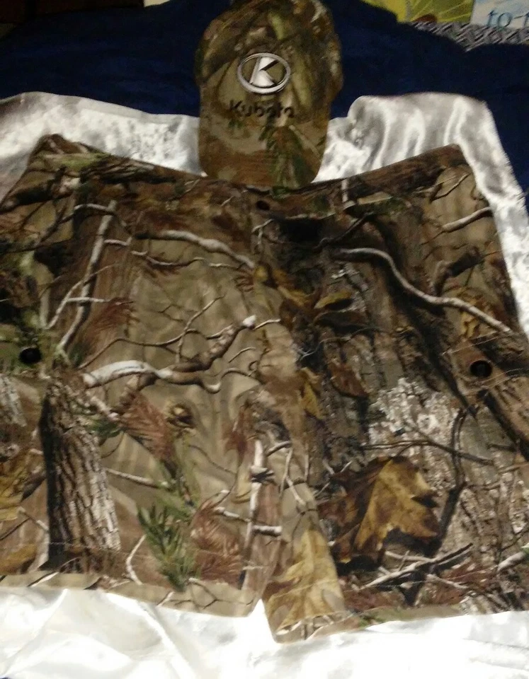 PANTALONES CORTOS DE CAMUFLAJE REALTREE GANDER MOUNTAIN TALLA XL Y SOMBRERO DE CAMUFLAJE KUBOTA Foto 1 de 4
