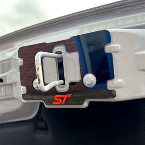 Mk2 /2,5 Puma - Proform Upper Bonnet Catch Plate - Gloss Black With ST Logo - Bild 1 von 2