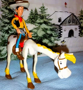 LUCKY LUKE 15,5 cm ET CHEVAL JOLLY JUMPER 21 cm FIGURINES COLLECTION BD DARGAUD - Imagen 1 de 24