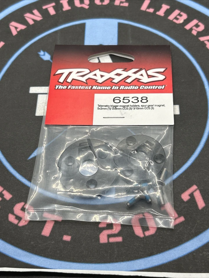 Traxxas. New. 6539. Telemetry Trigger Magnet Holders - Image 1 of 1