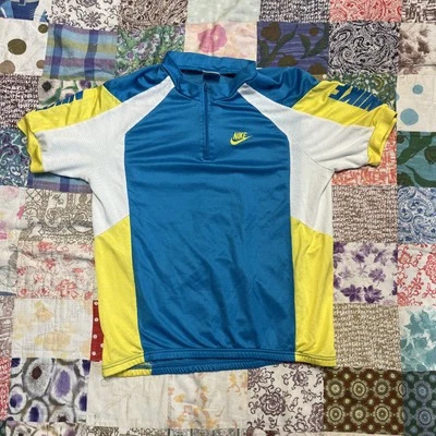 Camiseta deportiva de ciclismo vintage Nike azul deletreada para hombre talla pequeña años 80 90 retro Foto 1 de 4
