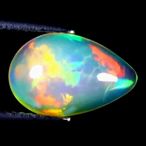 2,10 ct Blinkender Birnen Cabochon (13 x 8 mm) Äthiopischer Blinkender Regenbogen Opal - Bild 1 von 1