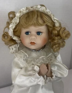 Vintage Porcelain Praying Doll Kneeling Blonde Girl Blue Eyes White Satin Dress - Picture 1 of 18