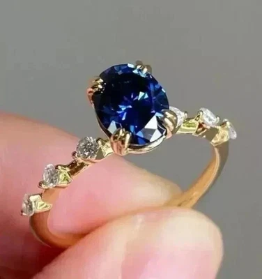 Anillo de compromiso solitario de tanzanita simulada corte ovalado acabado oro amarillo 14k Foto 1 de 4