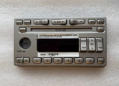03 Lincoln Navigator CD6 radio face. Worn buttons? Solve it w/ this new CD part Foto 1 de 2