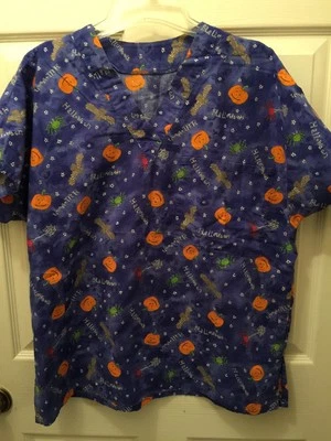 Womens scrub top Medium/ large Halloween blue  Spiders , Bats, Spiders, Pumpkins - Image 1 of 4