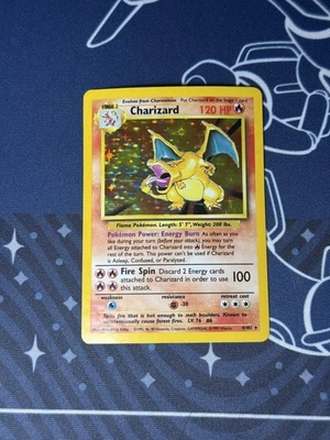 Charizard Holo 4/102 - Base Set Unlimited - Water Damage - Image 1 of 4