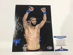 Foto firmada autografiada de Khamzat Chimaev BORZ 8x10 BECKETT BAS CERTIFICADO DE AUTENTICIDAD b - Imagen 1 de 5