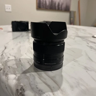 Sony SEL 35mm F/1.8 OSS Lens With Hood And Caps - Image 1 of 4