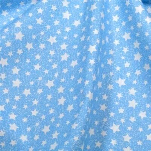 Small White Stars on Pale Blue, Connecting Threads Cotton,Half-Yard - Picture 1 of 5