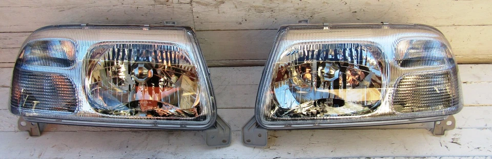 Par de faros eléctricos para Suzuki Grand Vitara 1999-05 diestro nuevo recambio  Foto 1 de 4