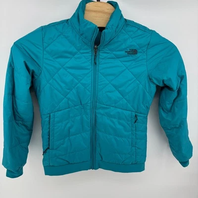 Jaqueta acolchoada The North Face feminina M isolada azul-petróleo com zíper bolsos **LEIA - Imagem 1 de 4