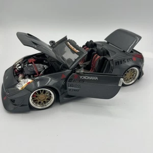 Muscle Machines 2004 Nissan 350Z Nismo Maßstab 1:18 Diecast Auto - Bild 1 von 12
