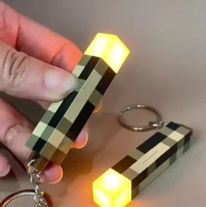 Porte-clés joueur animé brillant dans le noir : design torche classique - Photo 1 sur 7