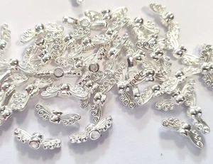 50 Engelsflügel Spacer Schmetterlingsflügel Flügel Farbe silber 14mm #S325 - Bild 1 von 3