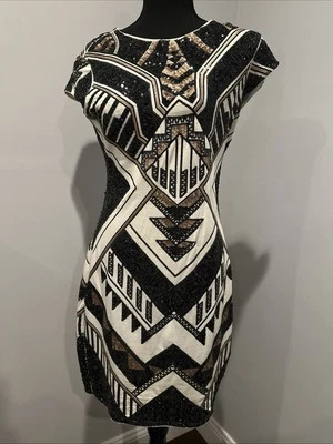 Vestido de cuerpo corto Express para mujer manga brillante negro y dorado talla M  Foto 1 de 4