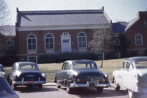 35MM Slide 1950s Kodachrome Red Border Cars Parked In Front Of Brick Building - Picture 1 of 1