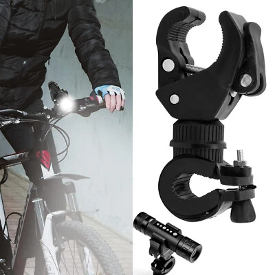 Soporte de montaje de linterna de bicicleta de rotación 90º Clip de faro LED para ciclismo Foto 1 de 4