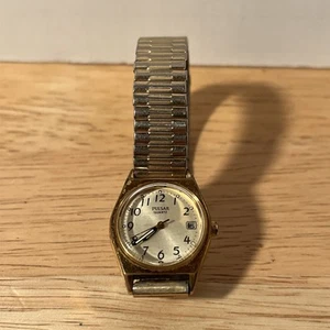 Vtg Pulsar Watch Women Gold Tone 27mm Date V827-0430 Speidel Stretch Band USA - Picture 1 of 12