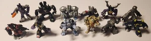 Lotto di 11 Figurine Hasbro Mini Transformers e 1 Little Tikes Numero Busters - Foto 1 di 24
