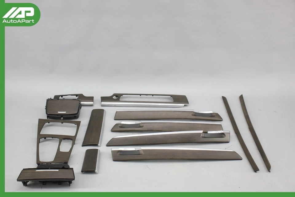 ✅ 09-12 BMW F01 750i 740i Juego de molduras de consola de tablero de puerta OEM Foto 1 de 4