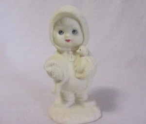 PORCELAIN LITTLE SNOW COVERED CHILD WITH PENQUIN FIGURINE MINT IN BOX - Picture 1 of 4