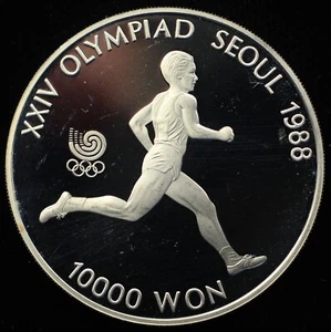 1986 South Korea 10000 Won .925 Silver Proof Coin - XXIV Olympics Track (P0233) - Picture 1 of 2