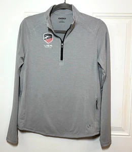 Camisa Top USA Esgrima Gris Manga Larga Cremallera Adulto Talla Mediana Rendimiento Elastizada - Imagen 1 de 15