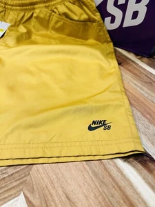 NWT Nike SB Skate Chino Woven Shorts DH2892-777 Gold Yellow Black Men Small Dunk - Picture 1 of 7