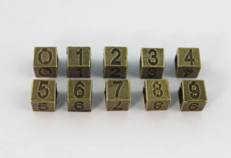 Dijes de cuentas con número de bronce envejecido 50 piezas con agujero grande #22901 Foto 1 de 1