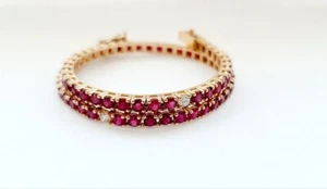 Un bracciale Tennis  lavorato in Oro Rosa 18kt 750/1000 con Rubino e Diamanti - Imagen 1 de 10