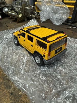 2003 Hummer H2 SUV w/ Sunroof Yellow Maisto 12147 1/27 Scale Diecast Car - Image 1 of 3