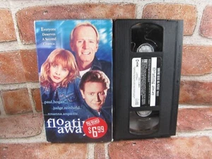 Floating Away VHS Video Paul Hogan Judge Reinhold Arquette Blockbuster - Picture 1 of 6