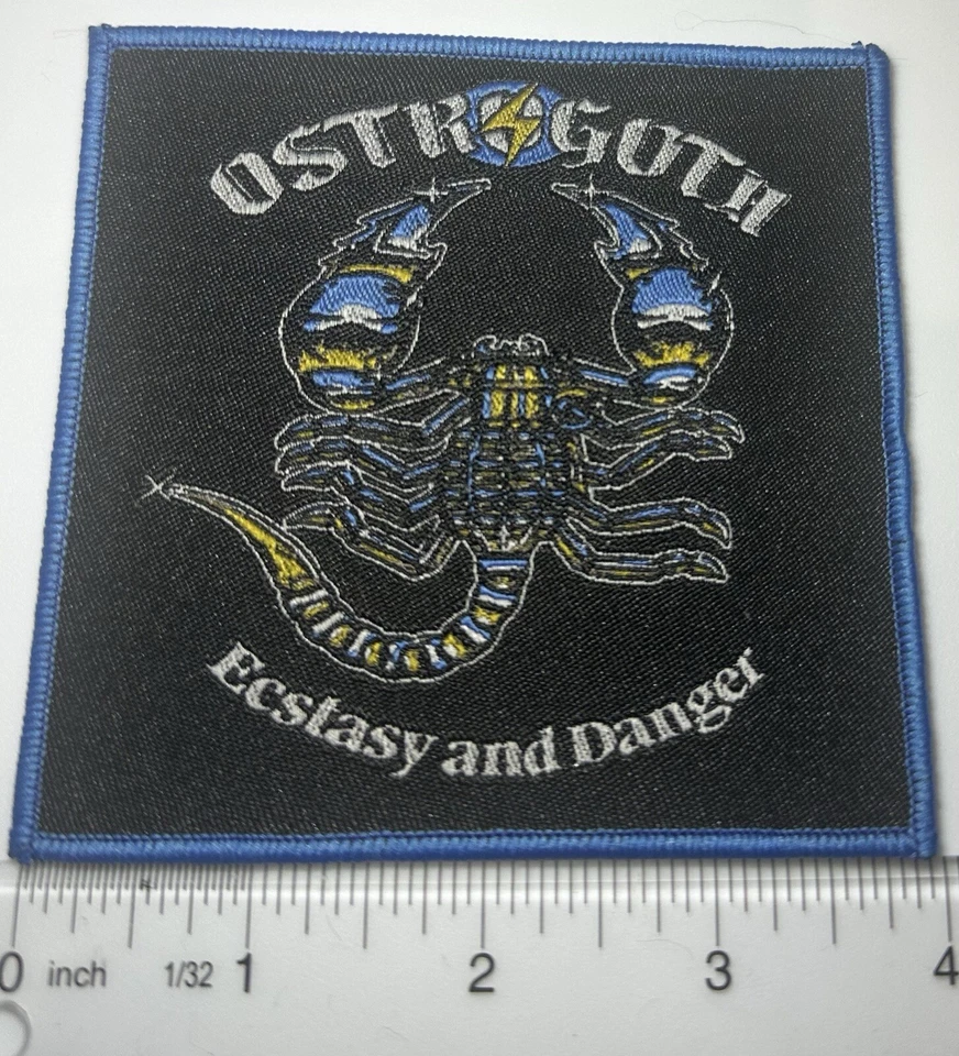 Ostrogoth Ecstasy And Danger Blue Border Woven Patch  - Image 1 of 1