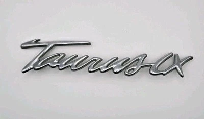 Ford Taurus LX 1997-99 emblema de parachoques  Foto 1 de 3