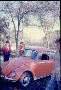 vintage 35mm slide 1975 people man boys by orange VW beetle Volkswagen car - Picture 1 of 1